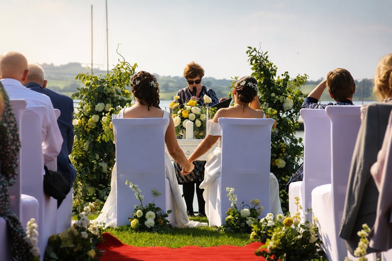 Outdoor wedding ceremony overlooking the lake at The Lakeside Manor in County Cavan.